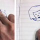 To document the evolution of the sketch, I took a photo after each addition. Or at least that was the plan. I forgot to do it after Roberts drew his orc head, so this photo was taken after the next contributor, my hand covering up the next person’s addition.